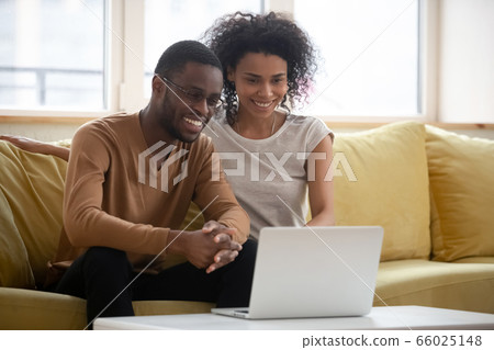 African millennial couple make videocall enjoy distant communication 66025148