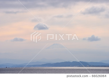 Mt.Fuji with clouds floating in the sky at Enoshima Higashihama 66026064