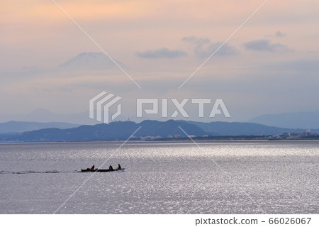 Mt.Fuji with clouds floating in the sky at Enoshima Higashihama 66026067