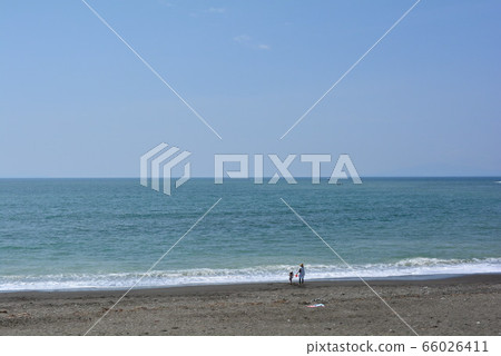 Beach swimming 66026411