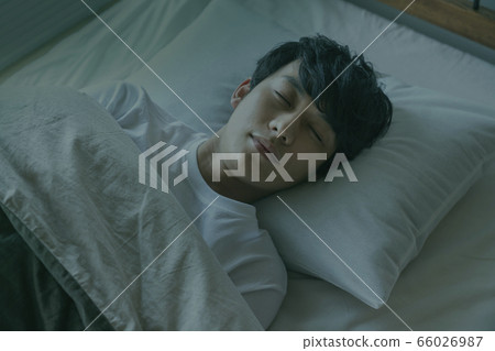 Young man sleeping face Young man sleeping face 66026987