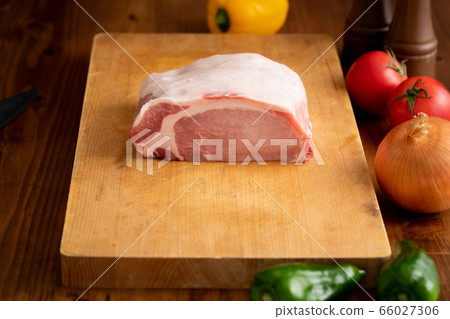 Pork loin on a cutting board Pork loin on a cutting board 66027306
