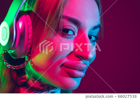 Portrait of young caucasian woman on purple background with copyspace, unusual and freaky appearance Portrait of young caucasian woman on purple background with copyspace, unusual and freaky appearance 66027538