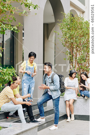 College students resting outdoors 66029561