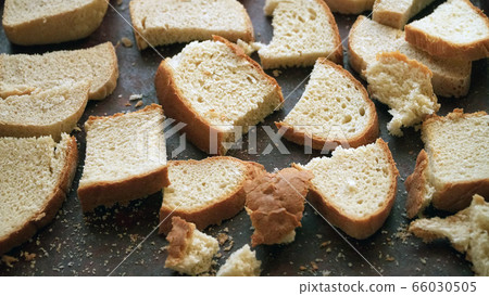Slices of sliced bread. Leftover bread 66030505