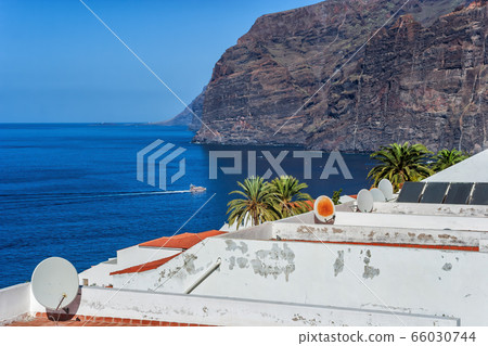 Cliffs and Town of Los Gigantes in Tenerife Cliffs and Town of Los Gigantes in Tenerife 66030744