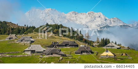 Mountain village in Alps, wooden houses in traditional style, Velika Planina, Kamnik, Slovenia Mountain village in Alps, wooden houses in traditional style, Velika Planina, Kamnik, Slovenia 66034405