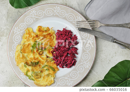 vegetarian Breakfast - omelet with pepper and beet 66035016