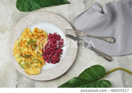 vegetarian Breakfast - omelet with pepper and beet vegetarian Breakfast - omelet with pepper and beet 66035017