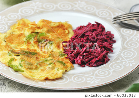vegetarian Breakfast - omelet with pepper and beet vegetarian Breakfast - omelet with pepper and beet 66035018