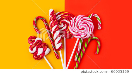 Colorful lollipop on  background. 66035369