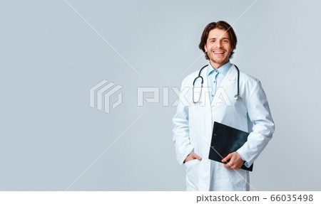 Medical Healthcare. Portrait of confident male doctor with stethoscope and clipboard 66035498