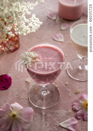 A glass of goat kefir with blended fruit 66035729
