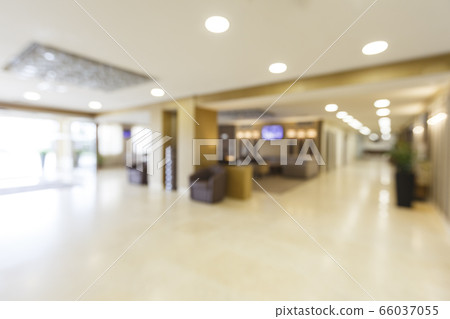 Blurred corridor and entrance of large hotel at day Blurred corridor and entrance of large hotel at day 66037055