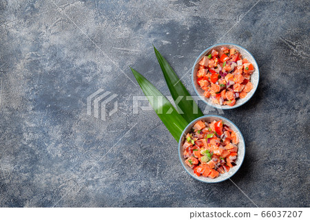 Hawaiian food Salmon Lomi Lomi. Salmon with tomatoes, onion and lemon Hawaiian food Salmon Lomi Lomi. Salmon with tomatoes, onion and lemon 66037207