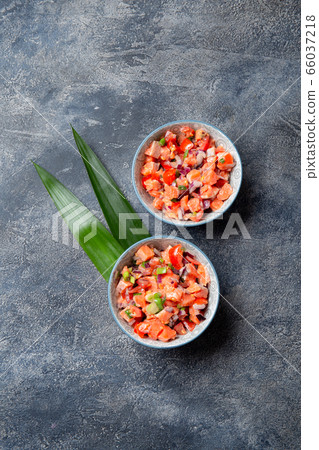 Hawaiian food Salmon Lomi Lomi. Salmon with tomatoes, onion and lemon Hawaiian food Salmon Lomi Lomi. Salmon with tomatoes, onion and lemon 66037218