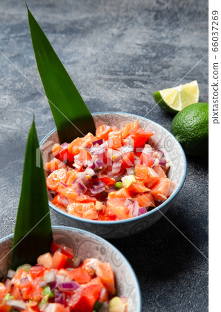 Hawaiian food Salmon Lomi Lomi. Salmon with tomatoes, onion and lemon Hawaiian food Salmon Lomi Lomi. Salmon with tomatoes, onion and lemon 66037269