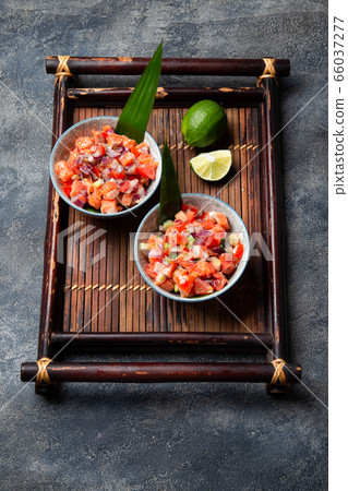 Hawaiian food Salmon Lomi Lomi. Salmon with tomatoes, onion and lemon 66037277