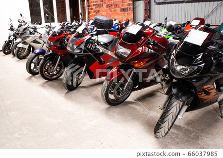 Colored sports road beautiful bikes in motor show Colored sports road beautiful bikes in motor show 66037985