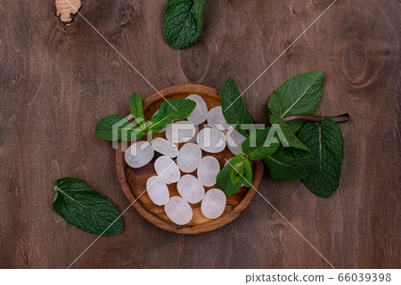 Sweet hard peppermint candy and mint Sweet hard peppermint candy and mint 66039398