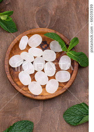 Sweet hard peppermint candy and mint Sweet hard peppermint candy and mint 66039399