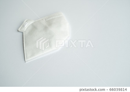 Respirator mask FFP or dust mask to cover the mouth and nose prevent coronavirus isolated on gray background. Breathing protection against air pollution, flu and coronavirus. 66039814