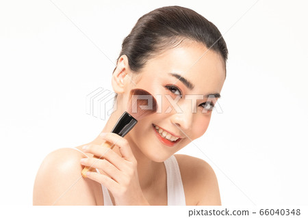 Beauty asian woman hold make up brush  and cheerful with make up brush 66040348