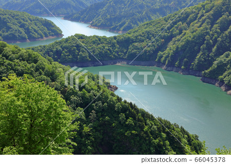 Fresh green Tagokura lake-National highway No. 252 from the 60 Jurikoshi Pass opening memorial monument Tadami Town, Fukushima Prefecture 66045378