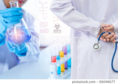 Doctor microbiologist with vacuum tubes for samples with COVID 19 infection atypical pneumonia virus Doctor microbiologist with vacuum tubes for samples with COVID 19 infection atypical pneumonia virus 66046677