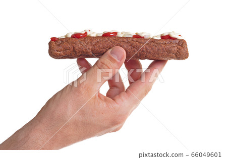 One frikadel with ketchup, mayonnaise on chopped One frikadel with ketchup, mayonnaise on chopped 66049601