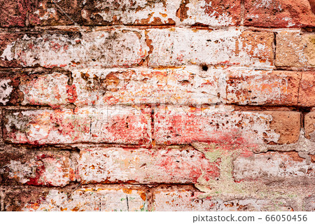 Texture of a brick wall with cracks and scratches Texture of a brick wall with cracks and scratches 66050456