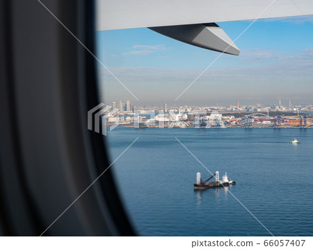 View from an aeroplane window as it prepares for take off 66057407