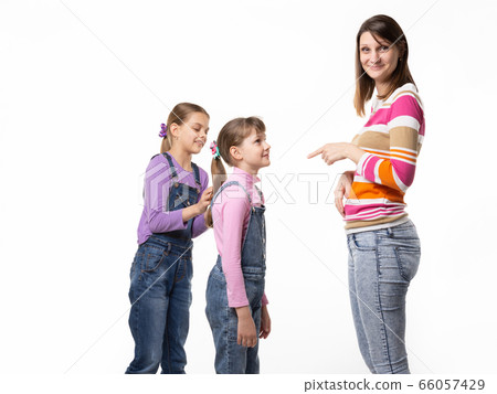 The girl begs the toy from her mother, mother The girl begs the toy from her mother, mother 66057429