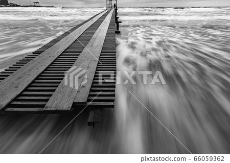 Black and white photo - surf in the storm after 66059362