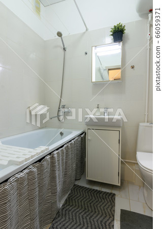 Classic cozy small bathroom with a toilet 66059371