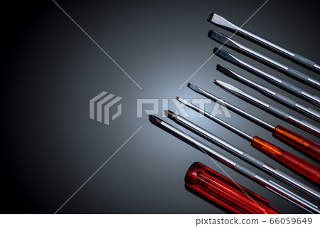 Screwdriver and center punch. Mechanic hand tools. 66059649
