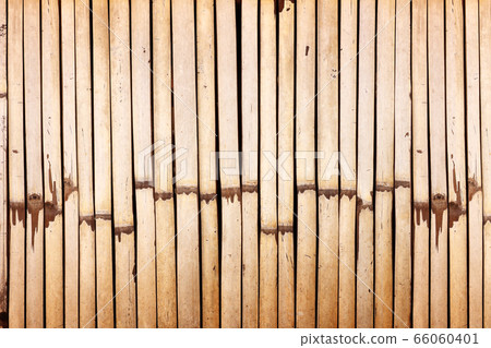 Old bamboo fence background; Old natural bamboo Old bamboo fence background; Old natural bamboo 66060401