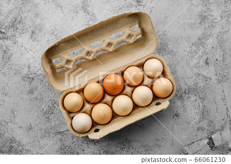 Fresh country eggs in cardboard packaging Fresh country eggs in cardboard packaging 66061230
