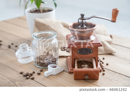 Ground beans in a coffee mill 66061282