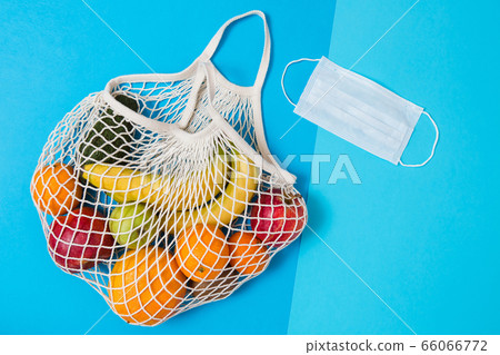 Textile bag with colorful fruit. Zero waste concept. 66066772
