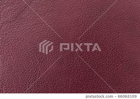 Texture of genuine leather, dark burgundy color, background, surface, pattern for backdrop. Manufacturing and leather industry concept Texture of genuine leather, dark burgundy color, background, surface, pattern for backdrop. Manufacturing and leather industry concept 66068109