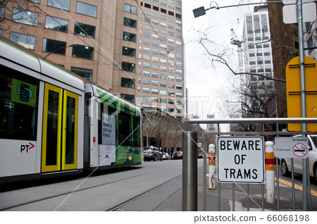 MELBOURNE, AUSTRALIA - JULY 26, 2018 - Tram in the city MELBOURNE, AUSTRALIA - JULY 26, 2018 - Tram in the city 66068198