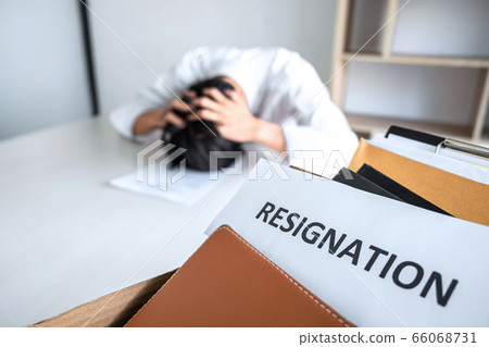 Images of packing up all his personal belongings Images of packing up all his personal belongings 66068731