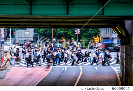 Tokyo cityscape in Japan crowded in front of Shinjuku large guard (left is towards Shinjuku station) 66069095