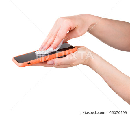 Woman hand clean mobile phone by wet wipe isolated 66070599