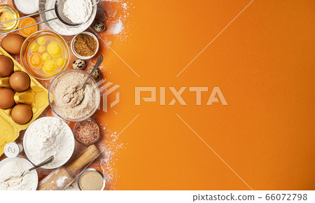 Baking ingredients on yellow color background, top view 66072798