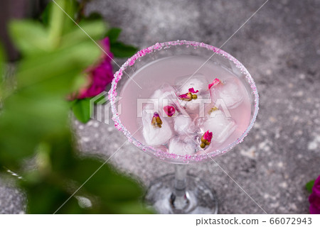 Pink cocktail Margarita with rose syrup 66072943