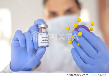 Young female scientist working in the CDC 66073784