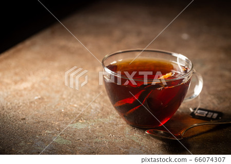 Tea bag in a glass cup Tea bag in a glass cup 66074307
