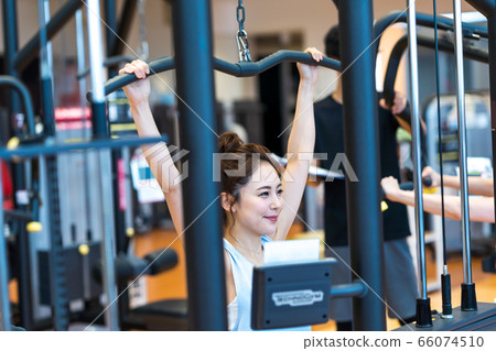 Young woman at the gym Young woman at the gym 66074510
